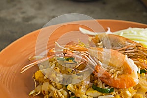 Asian noodles with shrimp and vegetables close-up (Pad Thai)