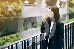 asian office women and coffee cup  with face mask