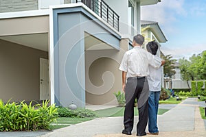 Asian old couple people buy new home from they savings after retirement