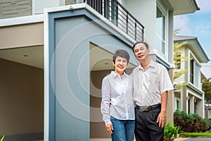 Asian old couple people buy new home from they savings after retirement