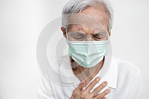 Asian old elderly have difficulty breathing,tired patient suffering from pain,chest feel tight,acute dyspnea,asthma,shortness of
