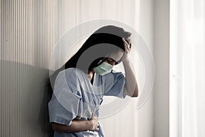 Asian patient woman wearing mask protect virus from sickness in hospital