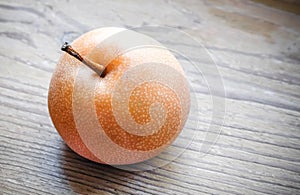 Asian pear on the wooden background