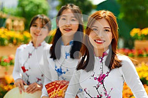 Asian People. Happy Women Wearing National Traditional Clothing.