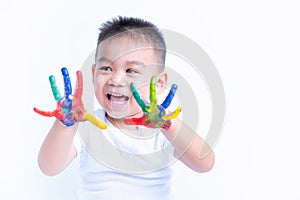 Asian portrait little baby boy show hand he have water color or finger paint on hands