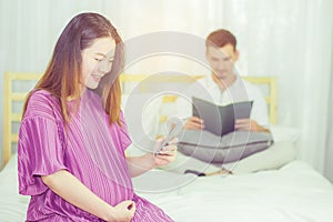 Asian pregnant people and expectation concept - happy pregnant