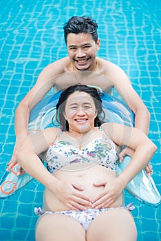 Asian pregnant woman. Mom and newborn baby. Mother day and International women day. Relax and recreation