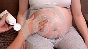 Asian Pregnant woman stay at home with husband. Love couple lifestyle of pregnancy