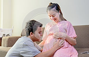 Asian Pregnant woman stay at home with husband. Love couple of pregnancy