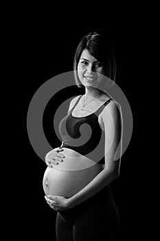 Asian pregnant women listening her baby