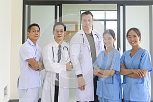 Asian professional confidence medic team are walking  in hospital, health care concept