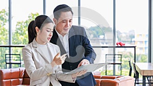 Asian professional successful female businesswoman secretary employee showing information strategy data via laptop notebook