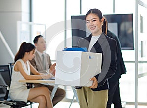 Asian professional successful new recruitment female employee businesswoman in formal business suit smiling standing moving in