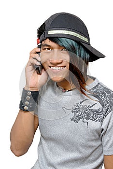 Asian punker calling by cell phone
