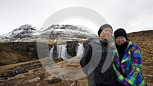 Asian retired senior travel around the world to Iceland. Happy t