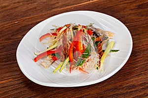 Asian salad with salmon skin