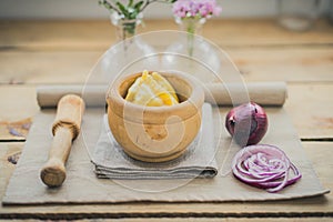 Asian samosas with red onion on wood recipient