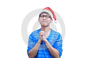 Asian Santa Claus man with eyeglasses and blue shirt has plead a