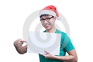 Asian Santa Claus man with eyeglasses and green shirt has holding a white blank advertisement banner isolated on white background