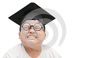 Asian school kid graduate bored with graduation cap isolated