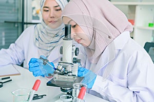 Asian scientist team has researching in laboratory