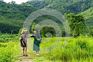 Asian Scout  wearing a mask and Show a new normal greeting