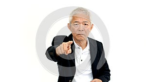 Asian senior business man wearing suit pointing with upset expre