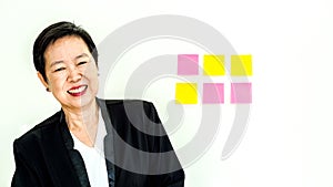 Asian senior business woman happy smiling expression face