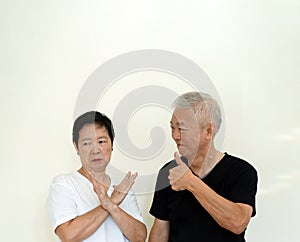 Asian senior couple disagree to each other conflict in relationship life