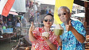 Asian senior couple having fun retirment trip around the world