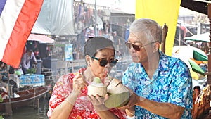 Asian senior couple having fun retirment trip around the world