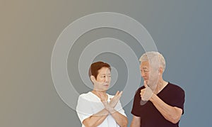 Asian senior couple relationship disagreement regular conflict in opinion copy space