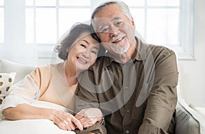Asian senior couple smiling at the camera. Family mature couple portrait.