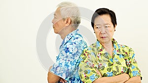 Asian senior couple unhappy, fighting. Relationship problem on w