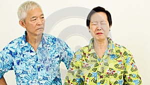 Asian senior couple unhappy, fighting. Relationship problem on w