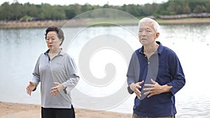 Asian Senior Elderly couple Practice Taichi, Qi Gong exercise ne photo