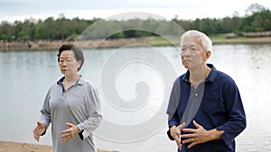 Asian Senior Elderly couple Practice Taichi, Qi Gong exercise ne photo
