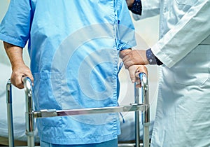 Asian senior or elderly old lady woman patient walk with walker in hospital