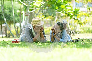 Asian senior elderly retire couple relaxation in the nature park happy and relax time