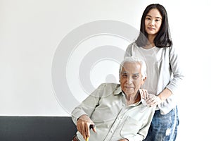 Asian senior father and adult daughter, Taking care of old parents, Happy family relationship.