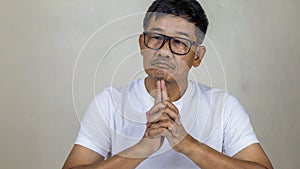 Asian senior man, face thinking about something isolated on white background - lifestyle senior male thinking about the
