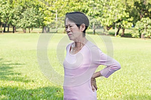 Asian senior woman back pain