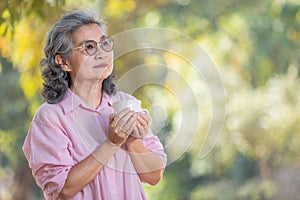 asian senior woman with coffee