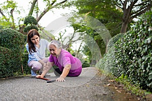 Asian senior woman fell down on lying floor because faint and limb weakness and Crying in pain form accident and her daughter came