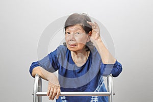 Asian seniors woman hearing loss ,Hard of hearing