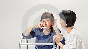 Asian seniors woman hearing loss ,Hard of hearing