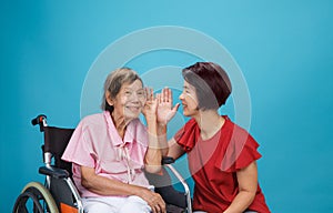 Asian seniors woman hearing loss ,Hard of hearing try to talk with daughter