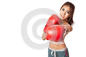 Asian slim girl punch with red boxing glove