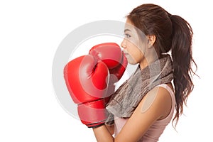 Asian slim girl with red boxing glove