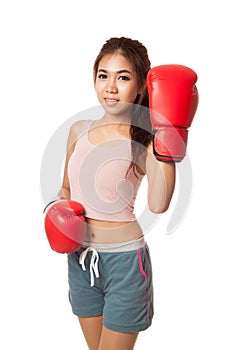 Asian slim girl with red boxing glove